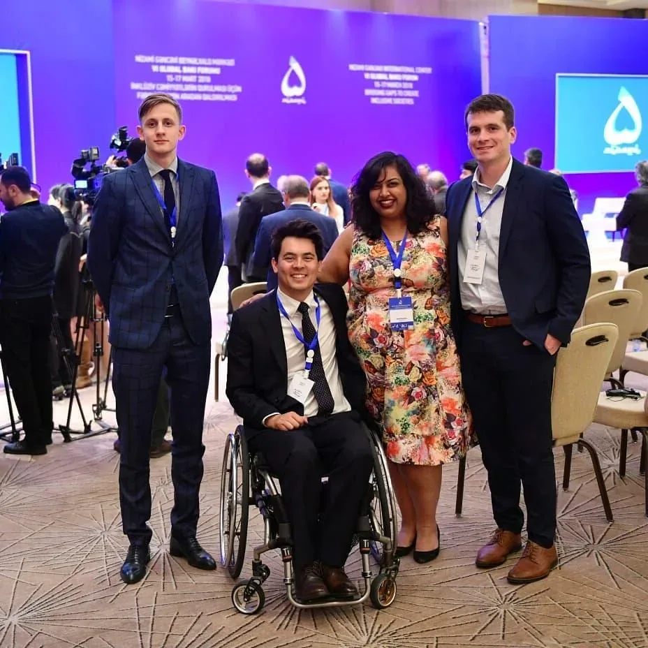 heidar with fellow delegates at the forum